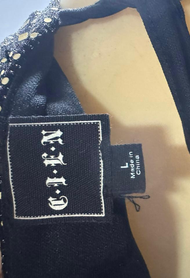 Enterizo negro y dorado